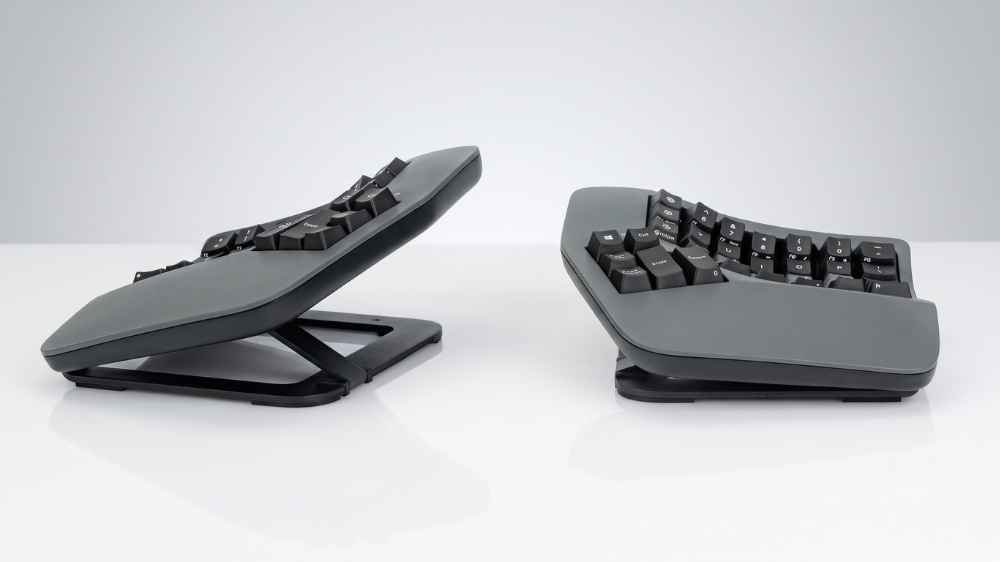 Kinesis Advantage360 Professional ergonomic split keyboard with concave keywells and columnar layout for coding comfort.