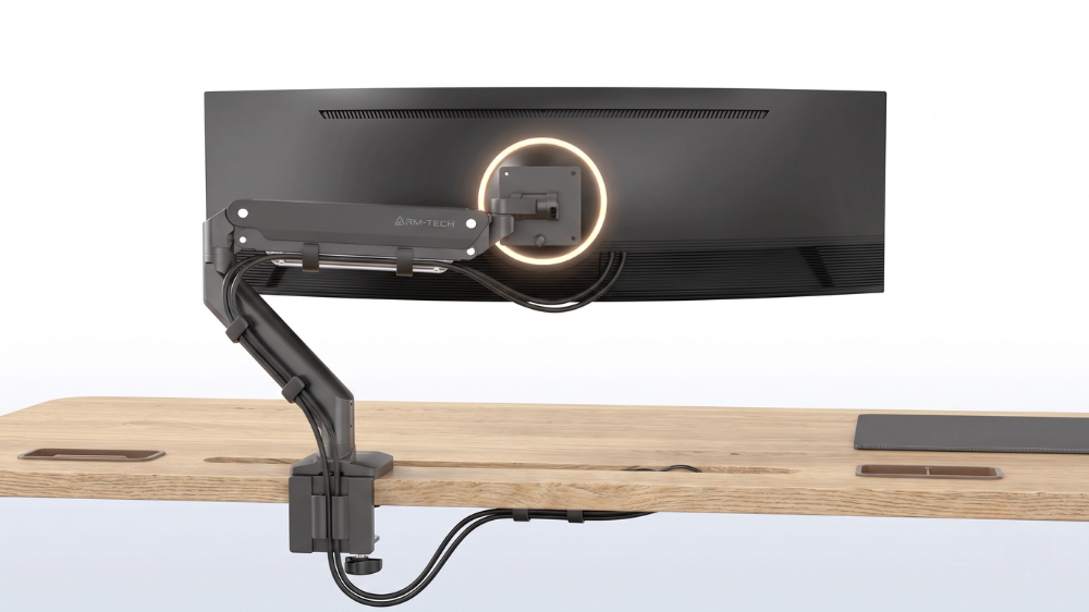 VIVO V100H heavy duty monitor mount supporting a curved ultrawide screen on a wooden desk.